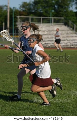 High school girls lacrosse. Editorial use only.