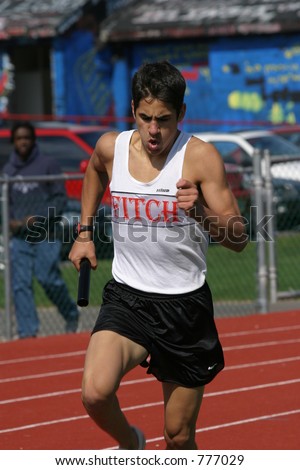 High school track runner. Editorial use only.