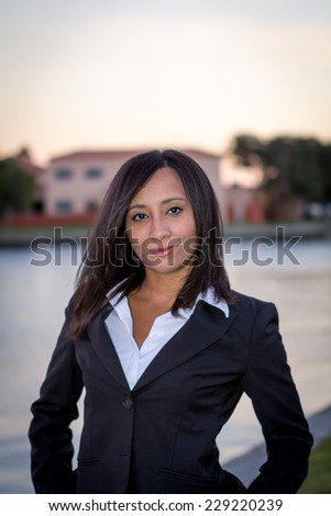 Female business woman head shot outdoors