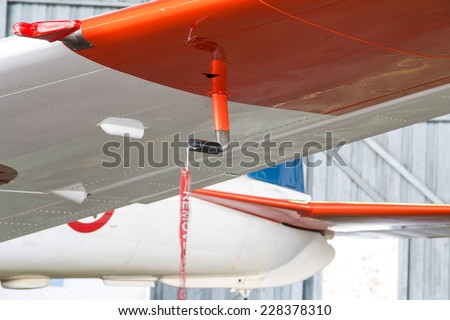 Aviation & airplane detail - remove before flight ribbon in a Pitot tube