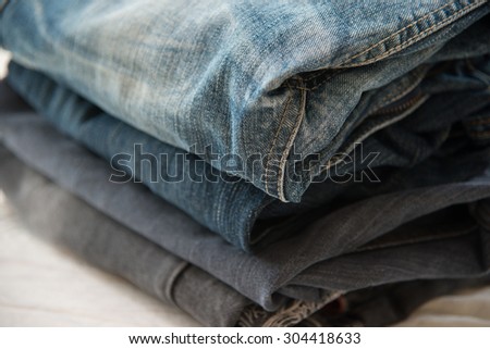 Pile of blue jeans close up,blue jeans texture