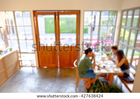 Blurred restaurant and people meeting background