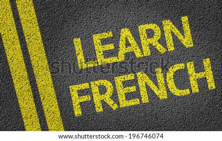 Learn French written on the road