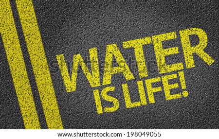 Water Is Life! written on the road