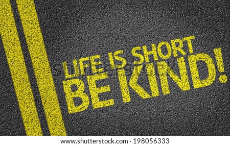 Life is Short Be Kind! written on the road