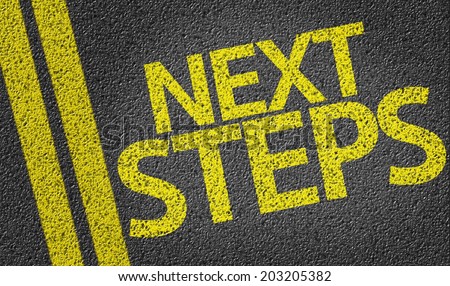 Next Steps written on the road