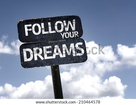 Follow your Dreams sign with clouds and sky background