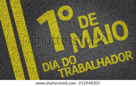1 de Maio, Dia do Trabalhador (In Portuguese: 1 May, Labor Day) written on the road
