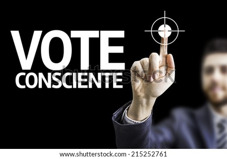 Business man pointing to black board with text: Conscious Vote (In Portuguese)