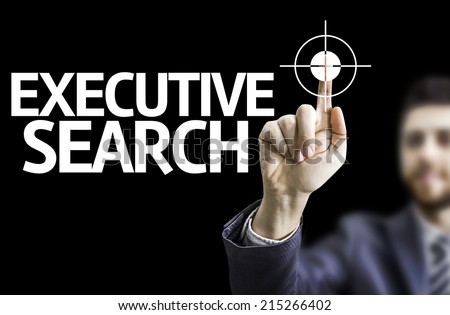 Business man pointing to black board with text: Executive Search
