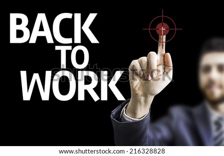 Business man pointing to black board with text: Back to Work