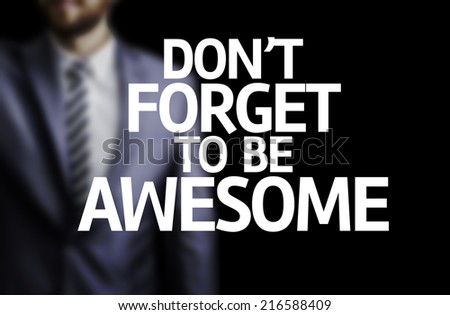 Don\'t Forget to Be Awesome written on a board with a business man on background