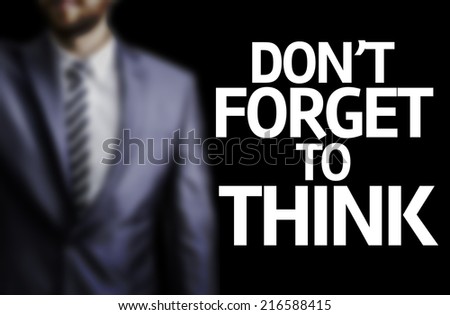 Don\'t Forget to Think written on a board with a business man on background