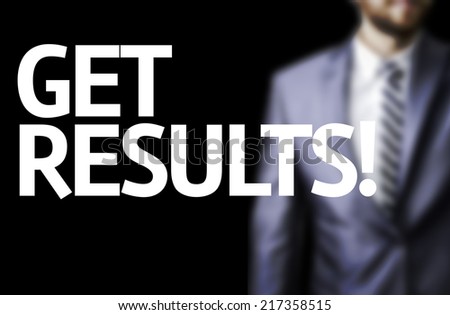 Get Results written on a board with a business man on background