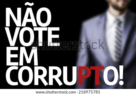 Don't Vote for Corruption (In portuguese) written on a board with a business man on background