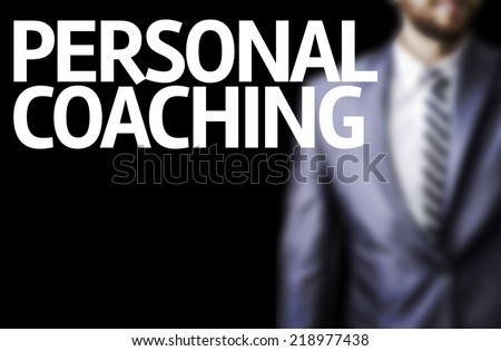 Personal Coaching written on a board with a business man on background