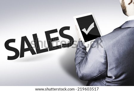 Business man with the text Sales in a concept image