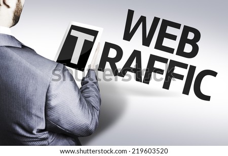 Business man with the text Web Traffic in a concept image