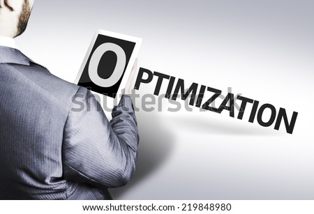 Business man with the text Optimization in a concept image