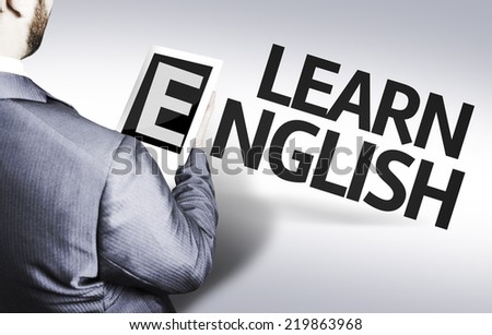 Business man with the text Learn English in a concept image