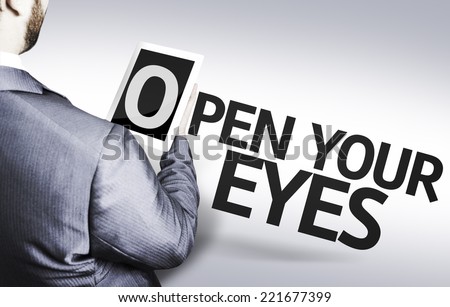 Business man with the text Open your Eyes in a concept image