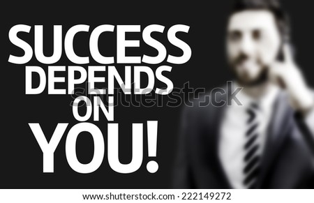 Business man with the text Success Depends On You! in a concept image