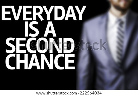 Business man with the text Everyday is a Second Chance in a concept image