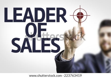 Business man pointing to transparent board with text: Leader of Sales