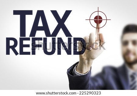 Business man pointing to transparent board with text: Tax Refund