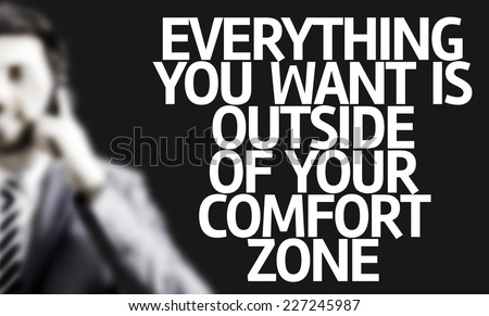 Business man with the text Everything You Want is Outside of Your Comfort Zone in a concept image