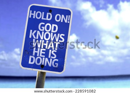 Hold On! God Knows What He is Doing sign with a beach on background