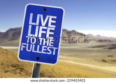 Live Life to the Fullest sign with a desert background
