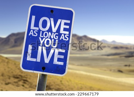 Love As Long As You Live sign with a desert background