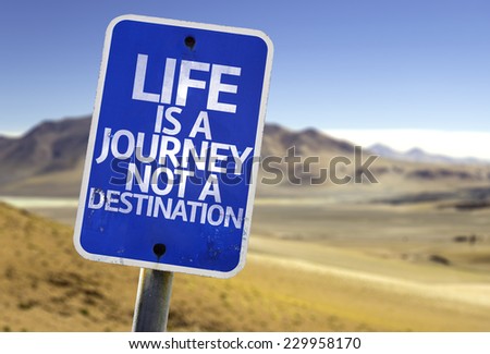 Life is a Journey not a Destination sign with a desert background