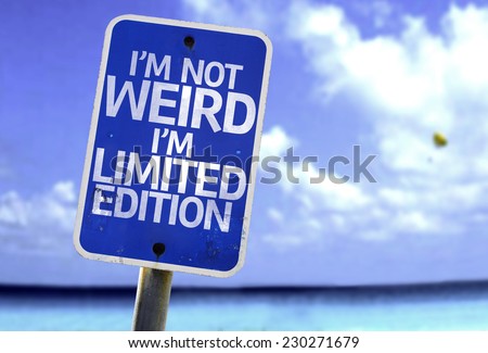 I\'m Not Weird Im Limited Edition sign with a beach on background