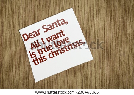 Dear Santa, All I Want is True Love This Christmas on Paper Note on texture background