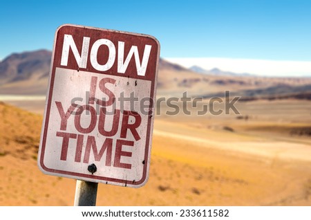 Now Is Your Time sign with a desert background
