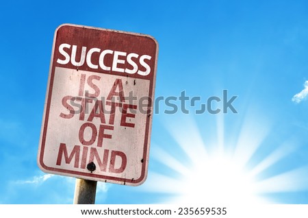 Success Is A State of Mind sign with sky background