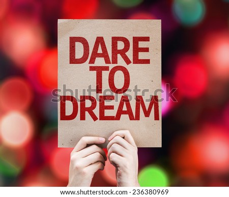 Dare To Dream card with colorful background with defocused lights