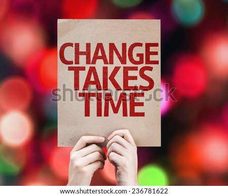 Change Takes Time card with colorful background with defocused lights