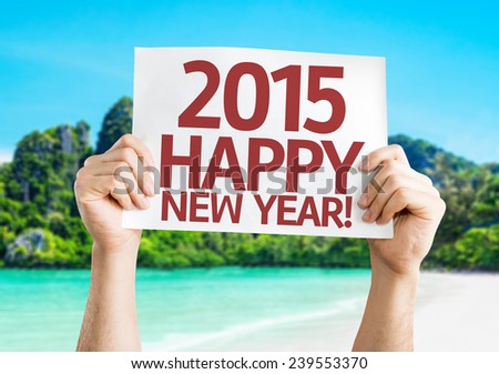 2015 Happy New Year card with a beach on background