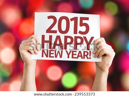 2015 Happy New Year card with colorful background with defocused lights