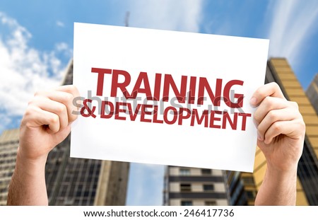 Training & Development card with a urban background