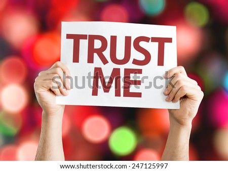 Trust Me card with colorful background with defocused lights