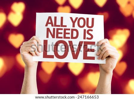All You Need is Love card with heart bokeh background