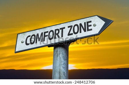 Comfort Zone sign with a sunset background