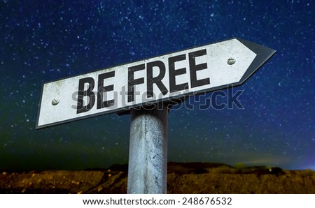Be Free sign with a beautiful night background