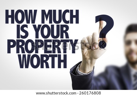 Business man pointing to transparent board with text: How Much is your Property Worth?