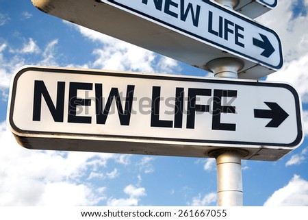 New Life direction sign on sky background