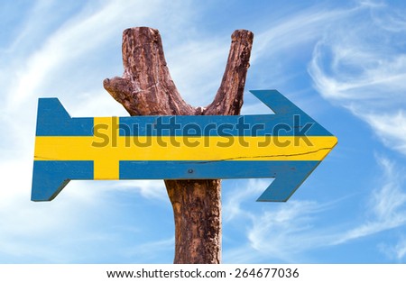 Sweden wooden sign with sky background